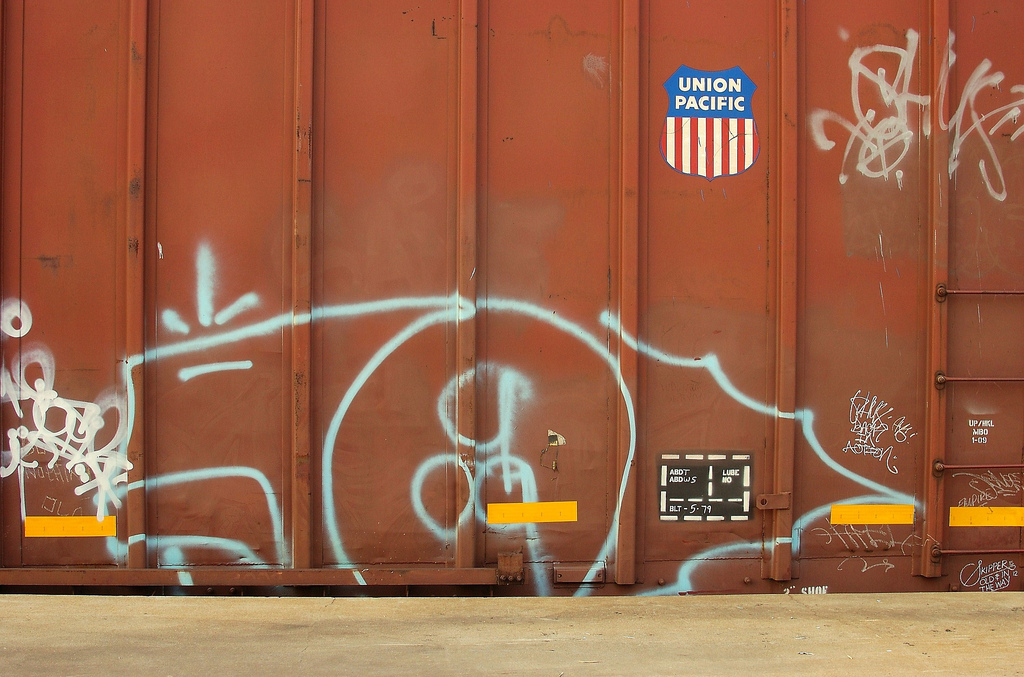 Grafitti on a red train
