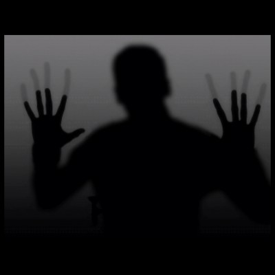 Creepy, dark silhouette of a man
